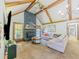 Bright and airy living room with vaulted ceilings, stone fireplace and a comfortable sofa at 3769 Bay Creek Church Rd, Loganville, GA 30052