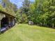 Lush yard with open storage shed and small shed at 3769 Bay Creek Church Rd, Loganville, GA 30052