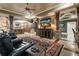 Spacious finished basement features comfortable seating, stone pillars and a full bar at 8970 Moor Park Run, Duluth, GA 30097