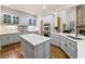 Modern kitchen featuring marble countertops, stainless steel appliances, and custom cabinetry at 8970 Moor Park Run, Duluth, GA 30097
