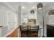 Eat-in kitchen featuring granite countertops and white cabinets at 2700 Pine Tree Rd # 3006, Atlanta, GA 30324