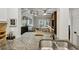 Open kitchen featuring granite countertops and modern light fixtures at 2700 Pine Tree Rd # 3006, Atlanta, GA 30324