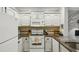 Updated kitchen with granite counters and white cabinets at 2700 Pine Tree Rd # 3006, Atlanta, GA 30324