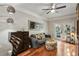 Cozy living room featuring hardwood floors and a ceiling fan at 2700 Pine Tree Rd # 3006, Atlanta, GA 30324