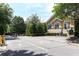 Visitor and Resident parking lot outside the leasing office for the community, with accessible parking spot at 2700 Pine Tree Rd # 3006, Atlanta, GA 30324