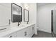 Modern bathroom featuring double vanity with black fixtures, and walk-in shower at 367 Parkway Ne Dr # 5, Atlanta, GA 30312