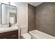 Bathroom with modern fixtures, tiled bath and shower combo, and contemporary design at 367 Parkway Ne Dr # 5, Atlanta, GA 30312