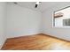 Bright bedroom with a ceiling fan, hardwood floors and a large window allowing plenty of light at 367 Parkway Ne Dr # 5, Atlanta, GA 30312