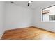 Bright bedroom with hardwood floors, natural light, and ceiling fan at 367 Parkway Ne Dr # 5, Atlanta, GA 30312