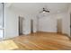 Spacious bedroom with hardwood floors, multiple doorways, and great natural light at 367 Parkway Ne Dr # 5, Atlanta, GA 30312