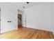 Minimalist bedroom featuring hardwood floors, closet, and natural light at 367 Parkway Ne Dr # 5, Atlanta, GA 30312