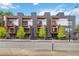 Modern townhome with sleek architectural details, balconies and landscaped greenery in a vibrant urban setting at 367 Parkway Ne Dr # 5, Atlanta, GA 30312