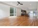 Open layout with hardwood floors, recessed lighting, and large windows providing natural light to the living space at 367 Parkway Ne Dr # 5, Atlanta, GA 30312
