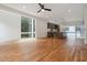 A modern living area featuring an open floor plan, large windows, and hardwood floors at 367 Parkway Ne Dr # 5, Atlanta, GA 30312