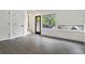 A modern living room with gray ceramic tile, natural light, and white trim at 367 Parkway Ne Dr # 5, Atlanta, GA 30312