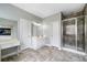 Main bathroom suite with vanity, shower, and fireplace at 5365 Glenhaven Dr, Cumming, GA 30041