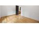 Bright and spacious bedroom featuring hardwood floors and a view into an adjacent room at 942 Fairfield, Marietta, GA 30068