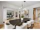 Dining room featuring modern lighting, hardwood floors, with open access to other rooms at 942 Fairfield, Marietta, GA 30068