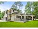 Beautiful home exterior with a spacious backyard, patio, and well-maintained lawn at 942 Fairfield, Marietta, GA 30068