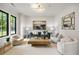 Inviting living room with modern furnishings, hardwood floors, and natural light at 942 Fairfield, Marietta, GA 30068