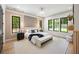 Serene main bedroom with a comfortable bed, large windows, and tasteful decor at 942 Fairfield, Marietta, GA 30068