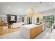 Bright open concept layout with gourmet kitchen open to the modern living room and dining area at 942 Fairfield, Marietta, GA 30068