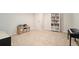 Basement showcasing a bookcase, area and piano for a fun and organized play space at 1031 Bailey Rd, Woodstock, GA 30188