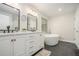 Bright bathroom featuring double sinks, a soaking tub, and modern fixtures, creating a serene and luxurious atmosphere at 1031 Bailey Rd, Woodstock, GA 30188