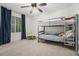Spacious bedroom featuring bunk beds and a large window providing ample natural light at 1031 Bailey Rd, Woodstock, GA 30188
