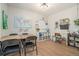 Versatile bonus room featuring a large table, white desk, and plenty of storage space, perfect for a home office or playroom at 1031 Bailey Rd, Woodstock, GA 30188