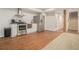 Basement kitchen featuring stainless steel appliances, a breakfast bar, and modern cabinets for a functional space at 1031 Bailey Rd, Woodstock, GA 30188