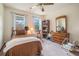 Cozy bedroom featuring a twin bed, natural light, and ample storage space at 225 W Union Grove Cir, Auburn, GA 30011