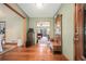 Warm and inviting foyer with hardwood floors, open layout, and easy access to the living spaces at 225 W Union Grove Cir, Auburn, GA 30011