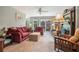Cozy living room with fireplace, large windows, and comfortable seating for Gathering and guests at 225 W Union Grove Cir, Auburn, GA 30011