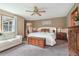 Bright main bedroom with a sitting area, neutral decor, and natural light at 225 W Union Grove Cir, Auburn, GA 30011