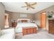 Comfortable main bedroom featuring neutral tones and plenty of natural light at 225 W Union Grove Cir, Auburn, GA 30011