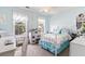 Bright ' bedroom with carpet flooring, natural light, and charming decor at 242 Sandhurst Ct, Suwanee, GA 30024
