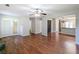 Open-plan living area featuring hardwood floors, recessed lighting, and access to the kitchen at 2918 Pavia Circle, Austell, GA 30106