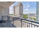 Balcony with city views; outdoor seating and weight equipment shown at 3040 Peachtree Nw Rd # 1013, Atlanta, GA 30305