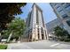 Exterior of a high-rise apartment building with a view from street level at 3040 Peachtree Nw Rd # 1013, Atlanta, GA 30305