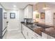 Bright kitchen featuring stainless steel appliances, granite countertops, and modern pendant lighting at 3040 Peachtree Nw Rd # 1013, Atlanta, GA 30305