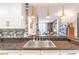 View from kitchen featuring stainless sink, countertops, and living room beyond at 3040 Peachtree Nw Rd # 1013, Atlanta, GA 30305
