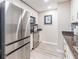 A modern kitchen with stainless steel appliances and a tile backsplash at 3040 Peachtree Nw Rd # 1013, Atlanta, GA 30305