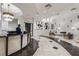 Luxurious lobby area with a modern reception desk, elegant lighting fixtures, and stylish seating at 3040 Peachtree Nw Rd # 1013, Atlanta, GA 30305