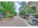 Outdoor kitchen and grilling area with seating, perfect for entertaining at 3040 Peachtree Nw Rd # 1013, Atlanta, GA 30305