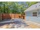 Spacious backyard deck featuring a built-in bar at 4038 Sharon Woods Dr, Powder Springs, GA 30127