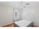 Bedroom featuring ceiling fan, window, and a comfortable bed at 4038 Sharon Woods Dr, Powder Springs, GA 30127