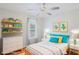 Bright bedroom showcasing stylish decor, colorful accents, and natural light at 4038 Sharon Woods Dr, Powder Springs, GA 30127