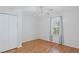 Cozy bedroom with wood floors, closet, and bright window at 4038 Sharon Woods Dr, Powder Springs, GA 30127