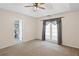 Comfortable bedroom with en-suite bathroom and private deck access at 4038 Sharon Woods Dr, Powder Springs, GA 30127